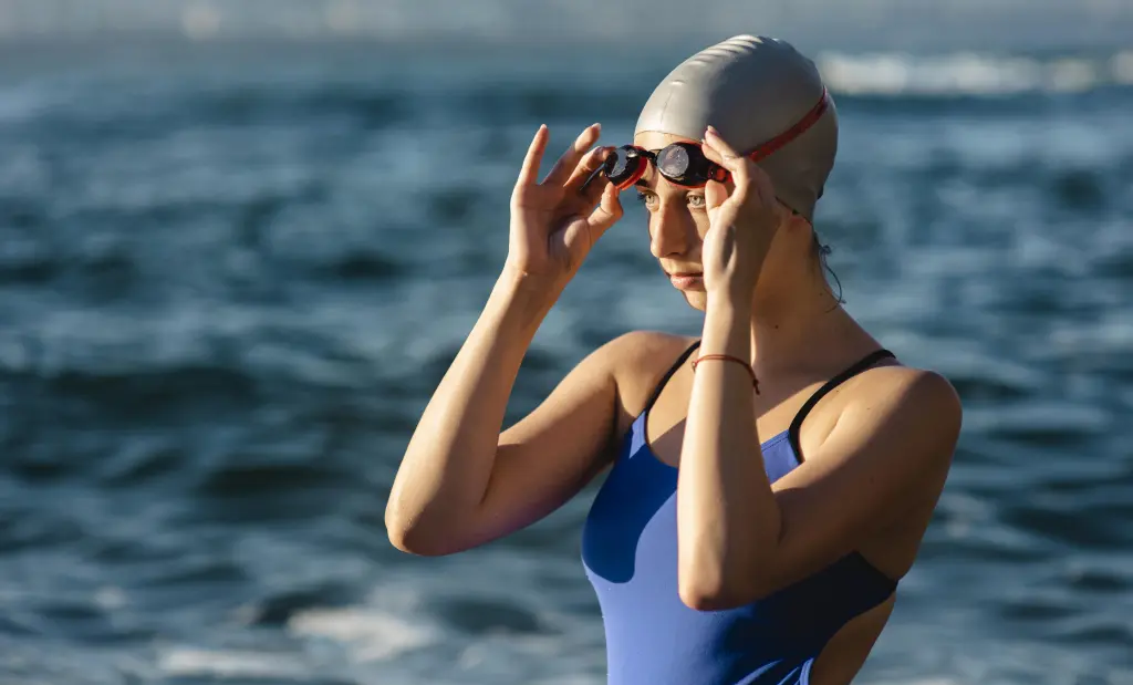side-view-of-female-swimmer-with-swimming-goggles-and-cap.jpg